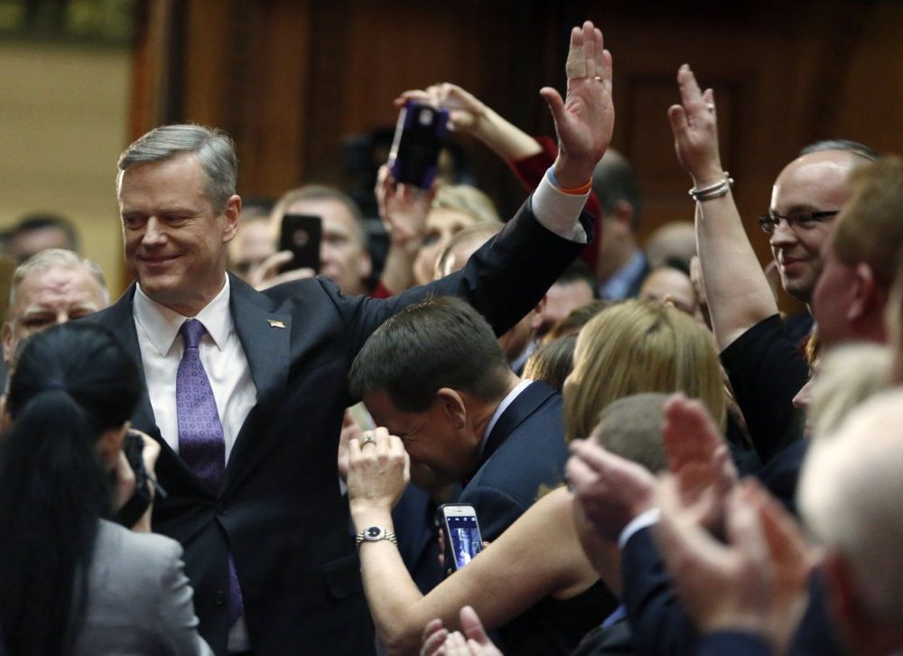 Gov. Charlie Baker arrives in the House chamber to deliver his State of the Commonwealth address Thursday evening. (Michael Dwyer/AP)