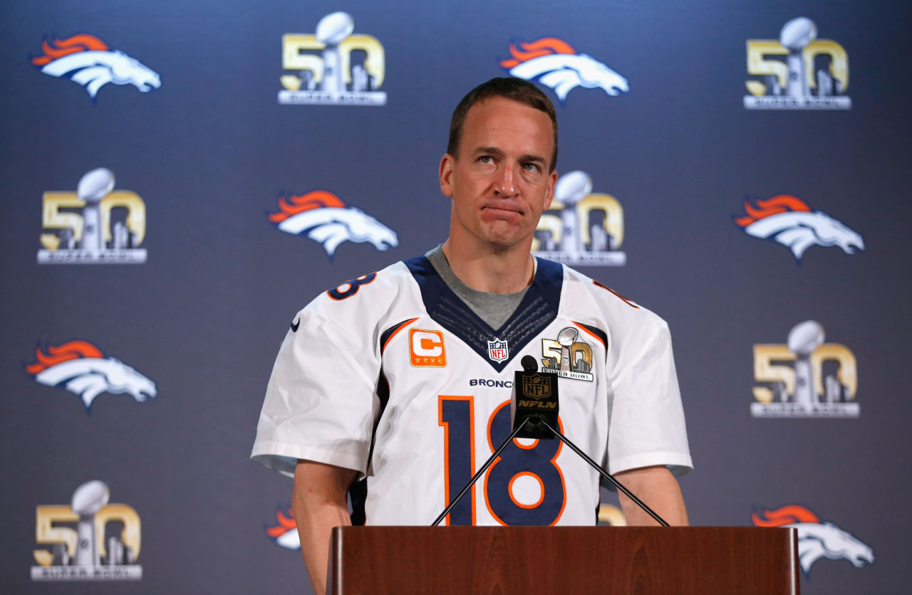 Broncos’ brave staff works / To reassemble Manning / For just one more game… (Ezra Shaw/Getty Images)