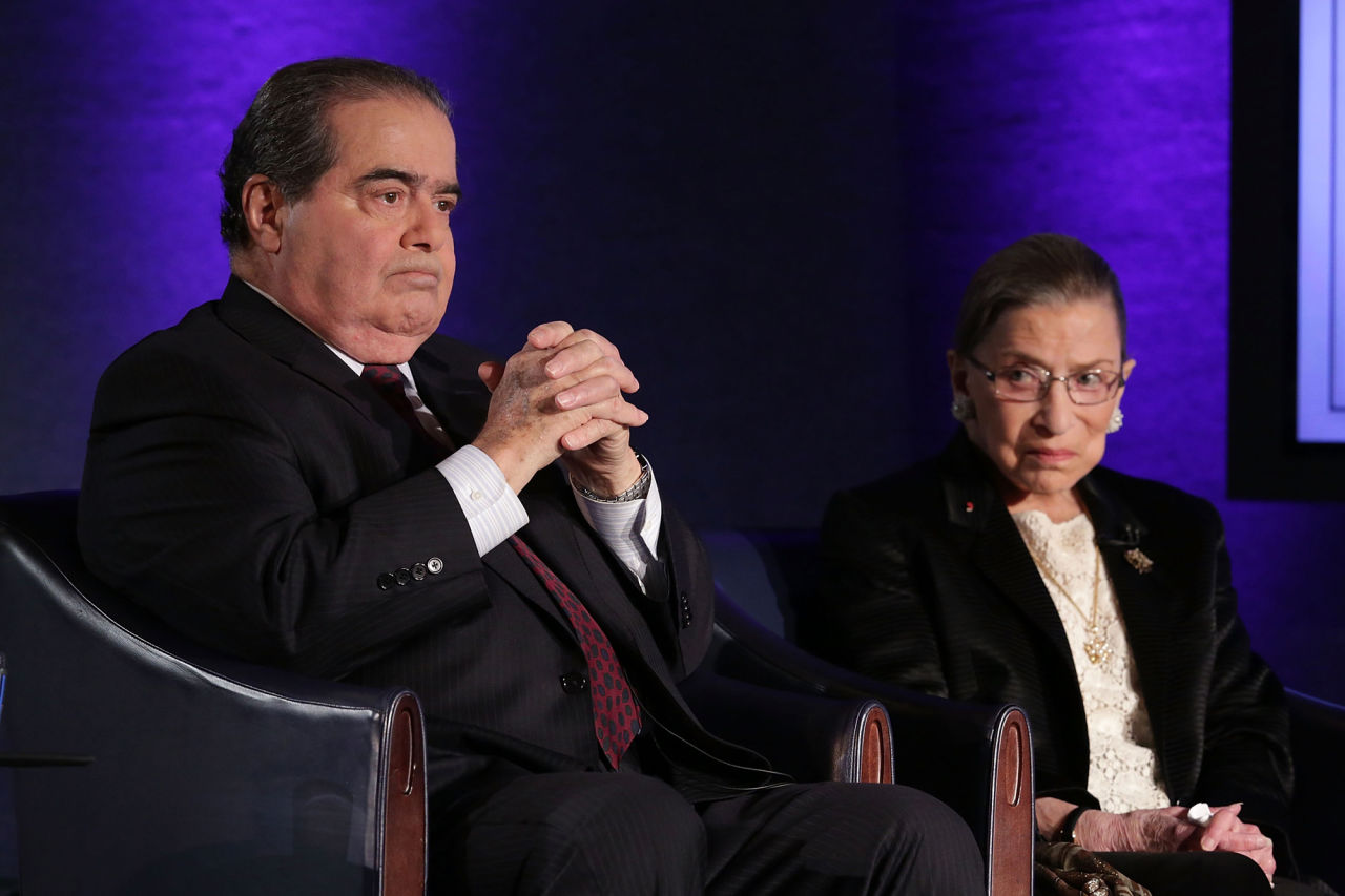 Supreme Court Justices Antonin Scalia (left) and Ruth Bader Ginsburg (right) wait for the beginning of the taping of "The Kalb Report" April 17, 2014 at the National Press Club in Washington, D.C. (Alex Wong/Getty Images)