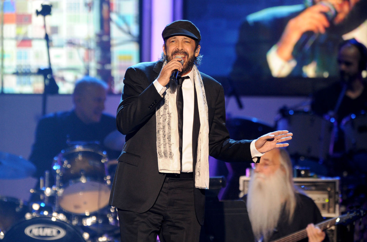Juan Luis Guerra performs "Lindeza" at the 2012 Latin Recording Academy Person of the Year Tribute to Caetano Veloso at the MGM Grand Garden Arena on Wednesday, Nov. 14, 2012, in Las Vegas. (Powers Imagery/Invision/AP)