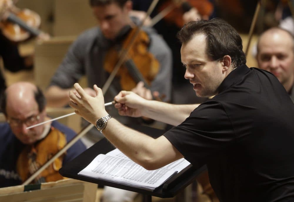 In this 2014 file photo, Boston Symphony Orchestra music director Andris Nelsons rehearses at Symphony Hall. The BSO won the orchestral performance Grammy for &quot;Shostakovich Under Stalin's Shadow,&quot; on Monday. It was the orchestra's first recording in a new partnership with the Deutsche Grammophon label, and its seventh Grammy overall. (Steven Senne/AP)