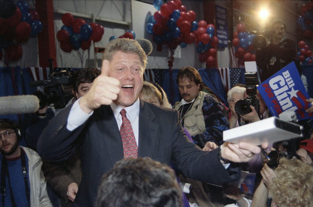 Then Democratic presidential hopeful Bill Clinton gives the thumbs up to supporters at a rally in Manchester, New Hampshire on Feb. 18, 1992. (Greg Gibson/AP)