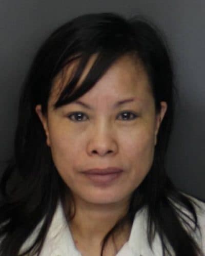 A booking photo of 44-year-old Xiao Ying Zhou, of Sandwich. (Suffolk County district attorney’s office)