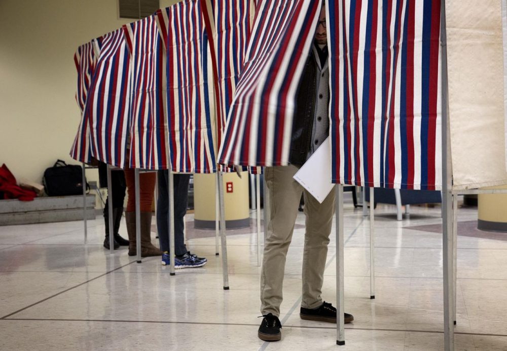 Voters at the polling station in the Spaulding Rehabilitation Hospital in Cambridge, Mass. (Robin Lubbock/WBUR)
