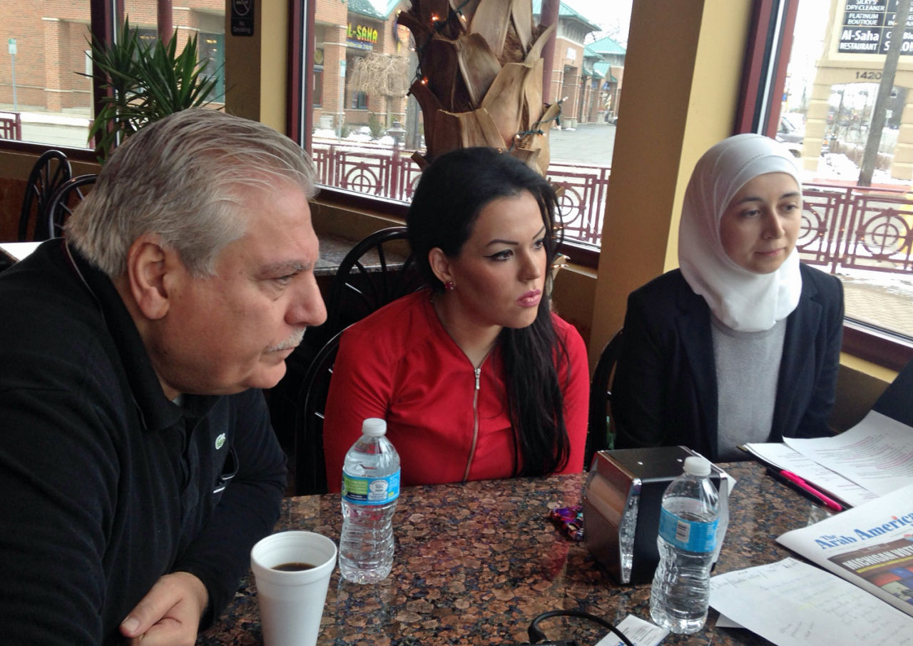 From left, Osama Siblani, publisher of the Arab American News; Nada Shatila, owner of Shatila bakery; and Iman Abdulrazzak of the Michigan Muslim Community Council, are pictured at the Shatila bakery in Dearborn. (Peter O'Dowd/Here &amp; Now)