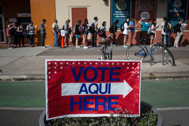 Voters wait in line to cast their Super Tuesday ballots at a polling station located at the University Co-op in Austin, Texas on Tuesday, March 1, 2016. Voters from Vermont to Colorado, Alaska to American Samoa and a host of states in between were heading to polling places and caucus sites on the busiest day of the 2016 primaries. (AP Photo/Tamir Kalifa)