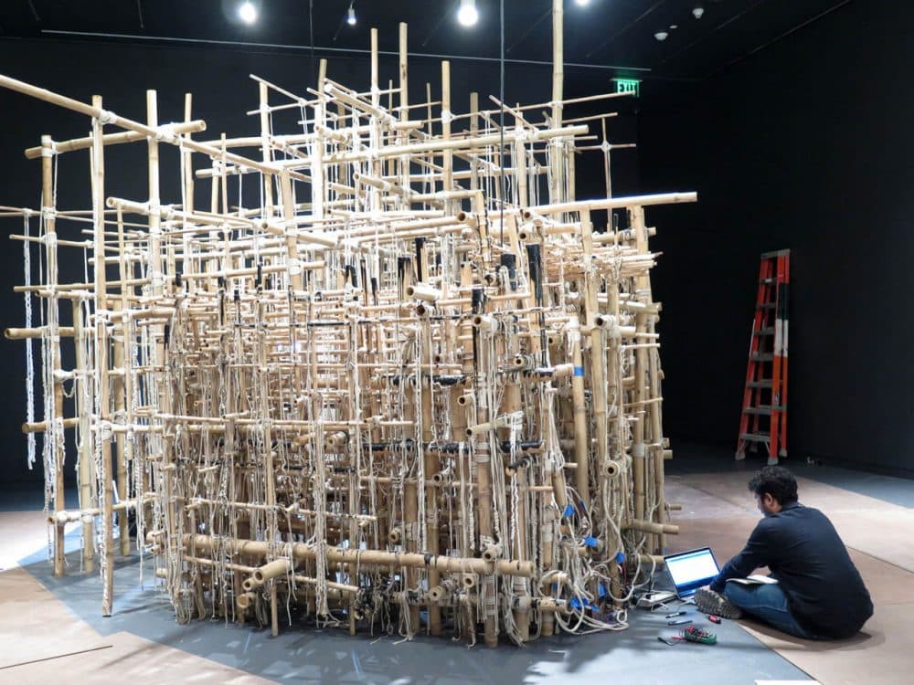 Asim Waqif's bamboo sound structure being set up at the MFA. (Andrea Shea/WBUR)