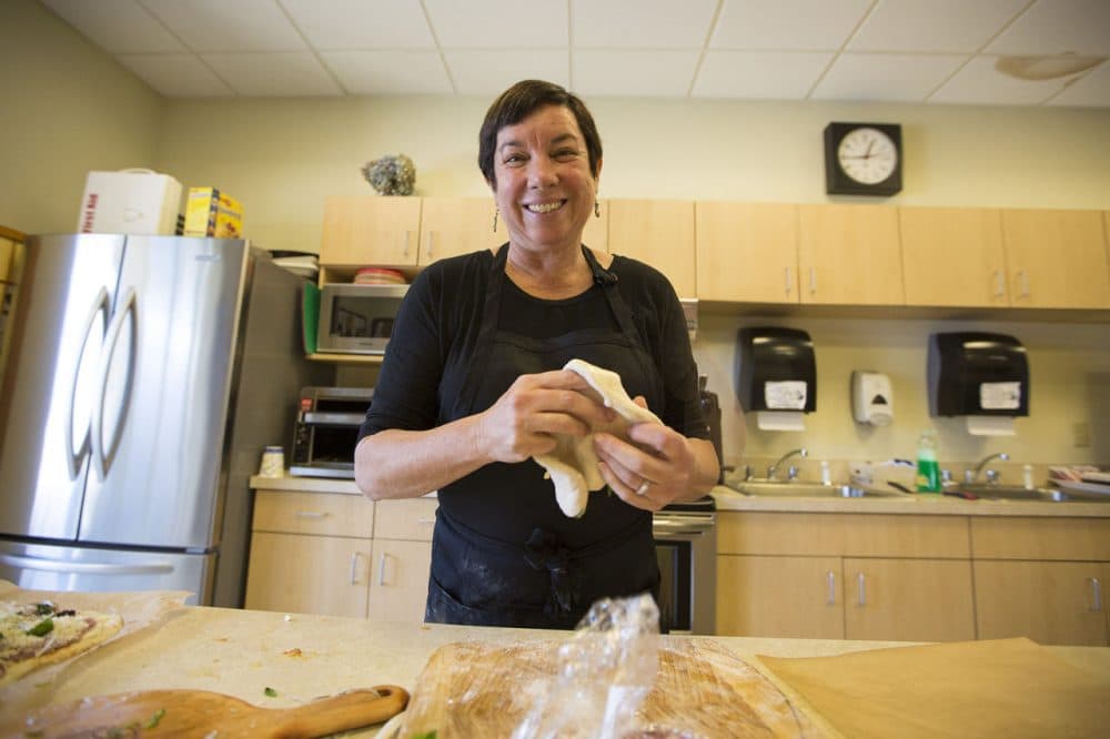 Kathy Gunst making pizza in the WBUR kitchen. (Jesse Costa/WBUR)