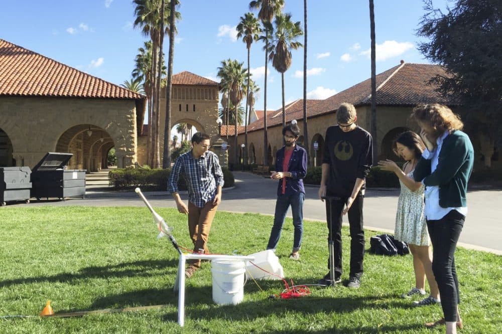 Students prepare a rocket launch for a science class on the campus of Stanford University in Palo Alto, California. (Eric Westervelt/NPR)
