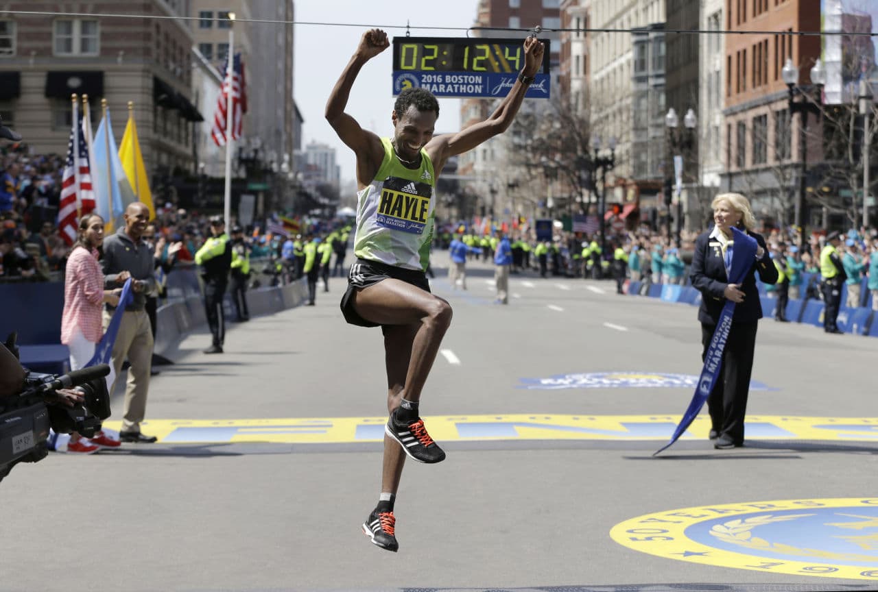 Lemi Berhanu Hayle of Ethiopia celebrates after winning the 120th Boston Marathon on Monday, April 18, 2016, in Boston. (Elise Amendola/AP)