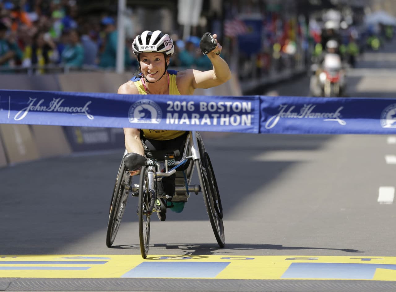 Tatyana McFadden of Clarksville, Md., crosses the finish line to win the women's wheelchair division of the 120th Boston Marathon on Monday, April 18, 2016, in Boston. (Elise Amendola/AP)