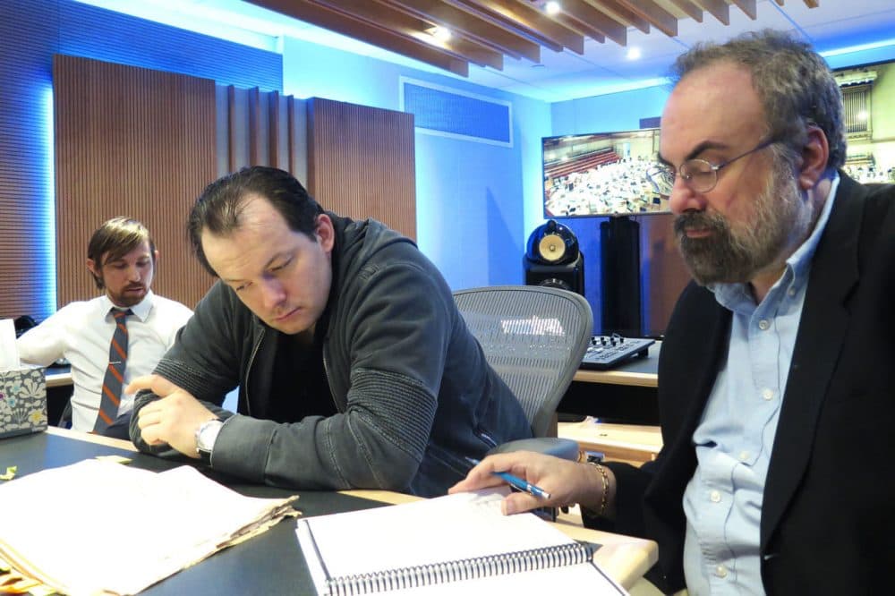 BSO engineer Nick Squire (left), music director Andris Nelsons (middle) and music editor Robert Wolff (right). (Andrea Shea/WBUR)