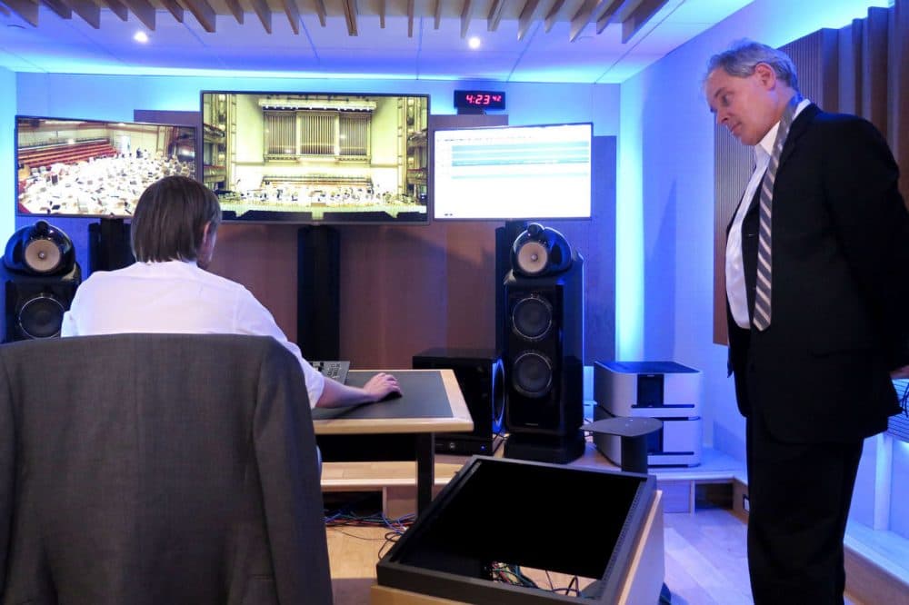 After the recorded performance, BSO principal oboe player John Ferrillo comes down into the studio to listen back to his solo with sound engineer Nick Squire. (Andrea Shea/WBUR)