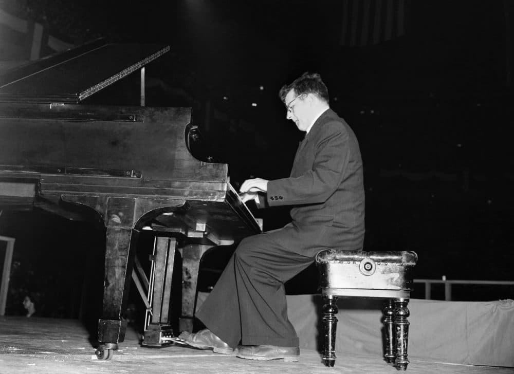 Dmitri Shostakovich plays the second movement of his fifth symphony in Madison Square garden in New York on March 27, 1949 as part of the Soviet delegation to the Cultural and Scientific conference for World Peace. (Marty Lederhandler/AP)