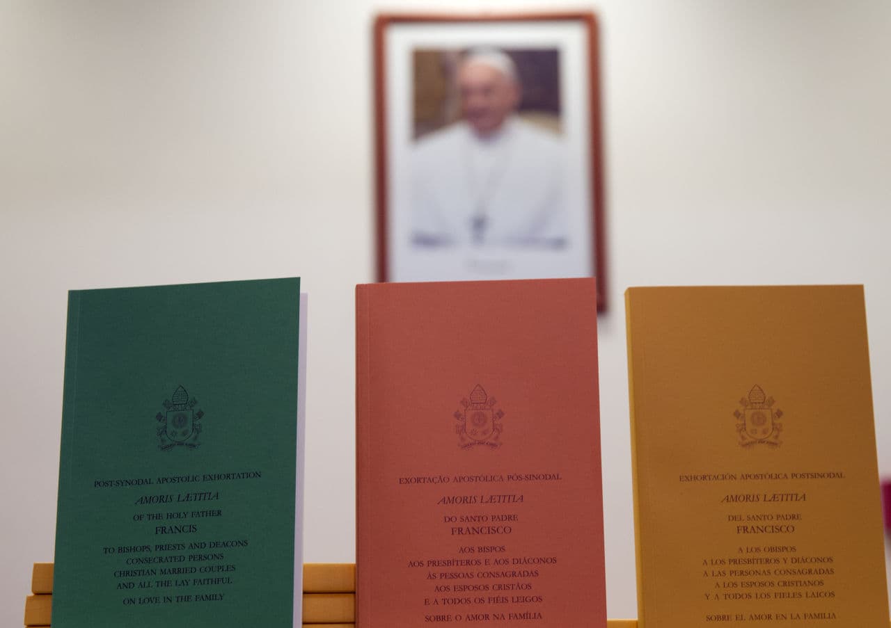 Copies of the post-synodal apostolic exhortation, Amoris Laetitia, are on display prior to the start of a press conference, at the Vatican, Friday, April 8, 2016. (Andrew Medichini/AP)