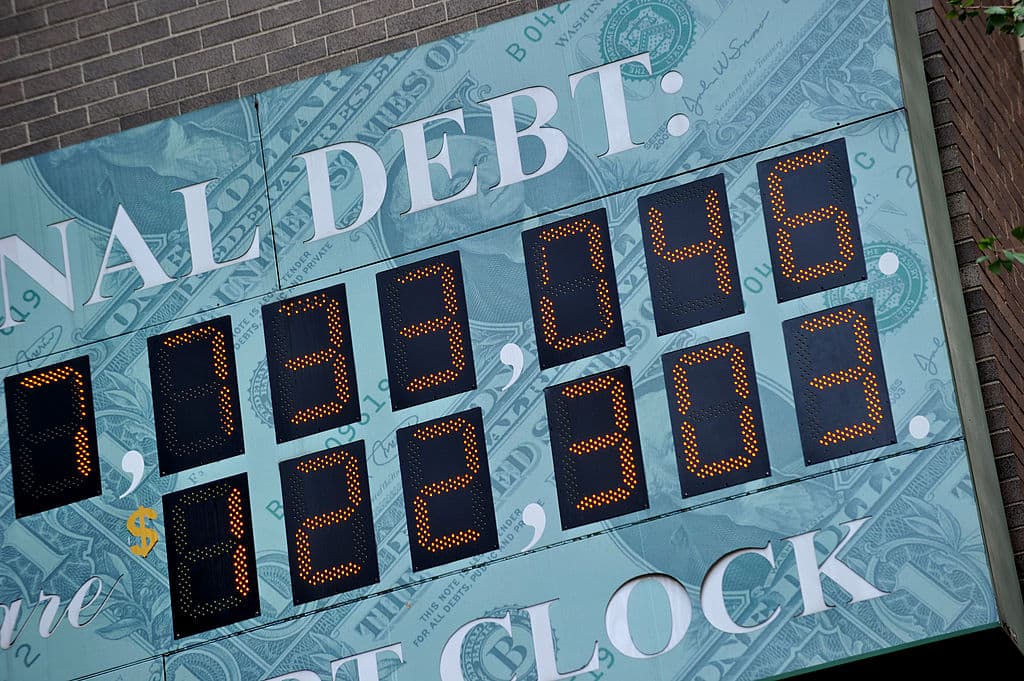 Detail of the National Debt Clock, a billboard-size digital display showing the increasing US debt, on Sixth Avenue August 1, 2011 in New York. US Vice President Joe Biden said Monday he was confident that Congress would approve a major austerity plan to avoid a debt default as he met with skeptical members of his Democratic Party.AFP PHOTO/Stan HONDA (Photo credit should read STAN HONDA/AFP/Getty Images)