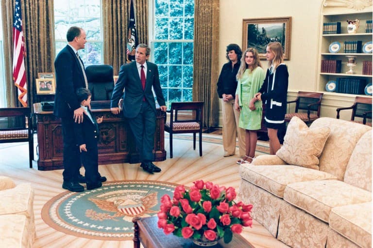 Ron Fournier and his family meet George W. Bush in the Oval Office. (Courtesy Ron Fournier) 