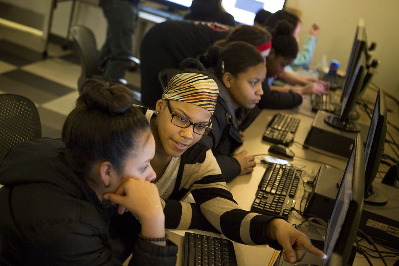 With the assistance of volunteers and other instructors, members of the Brookview House Girls Who Code Club meet every Wednesday to hone basic coding skills. (Jesse Costa/WBUR)