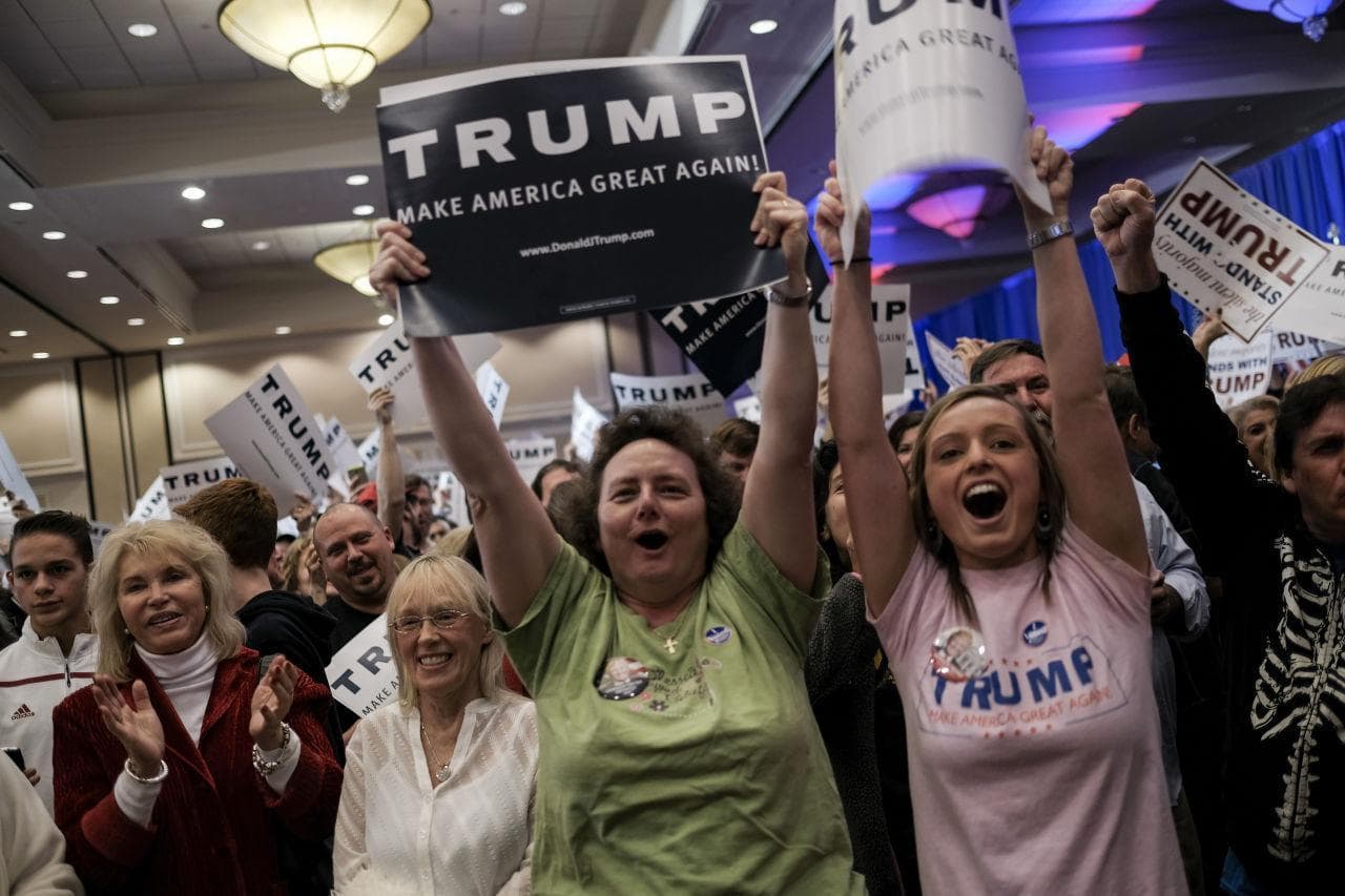 On February 20, 2016, supporters cheer as Republican presidential candidate Donald Trump is declared the winner of the South Carolina primary at his election night party in Spartanburg, South Carolina. (Spencer Platt/Getty Images)