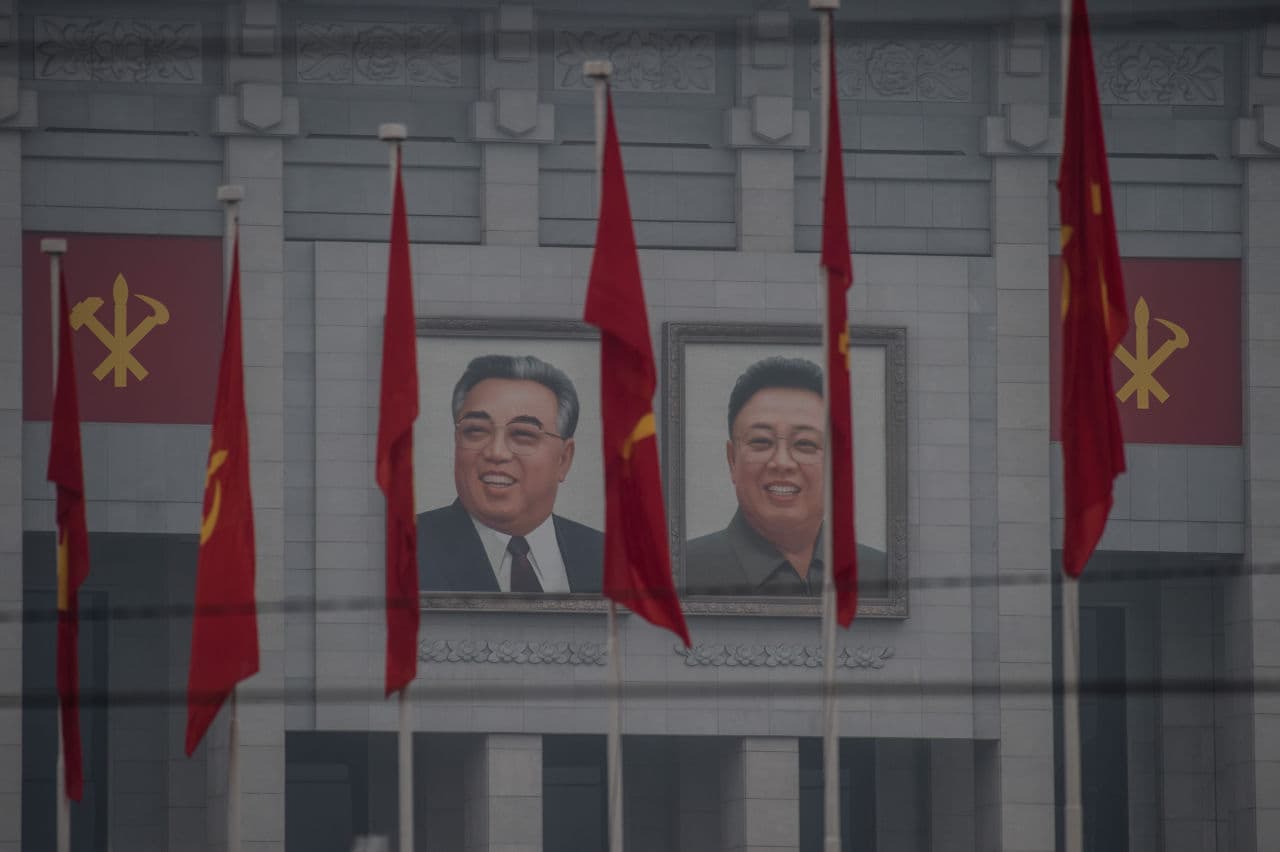 A general view shows portraits of late North Korean leaders Kim Il-Sung (L) and Kim Jong-Il (R) on the 'April 25 Palace', the venue of the 7th Workers Party Congress in Pyongyang on May 6, 2016.
North Korea on May 6 kicked off its biggest political show for a generation, aimed at cementing the absolute rule of leader Kim Jong-Un and shadowed by the possibility of an imminent nuclear test. (Ed Jones/AFP/Getty Images)