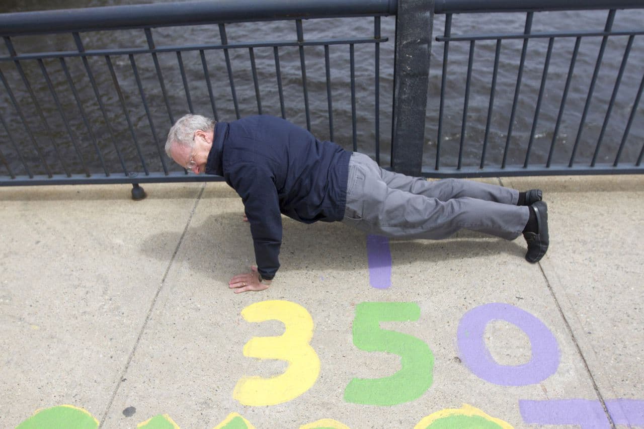 Oliver Smoot who stands at 5’7” was used to measure the Massachusetts Avenue Bridge as part of a MIT fraternity prank in 1958. The markings on the bridge and the legacy of the unit of measurement know as the Smoot live on. (Joe Difazio/WBUR)