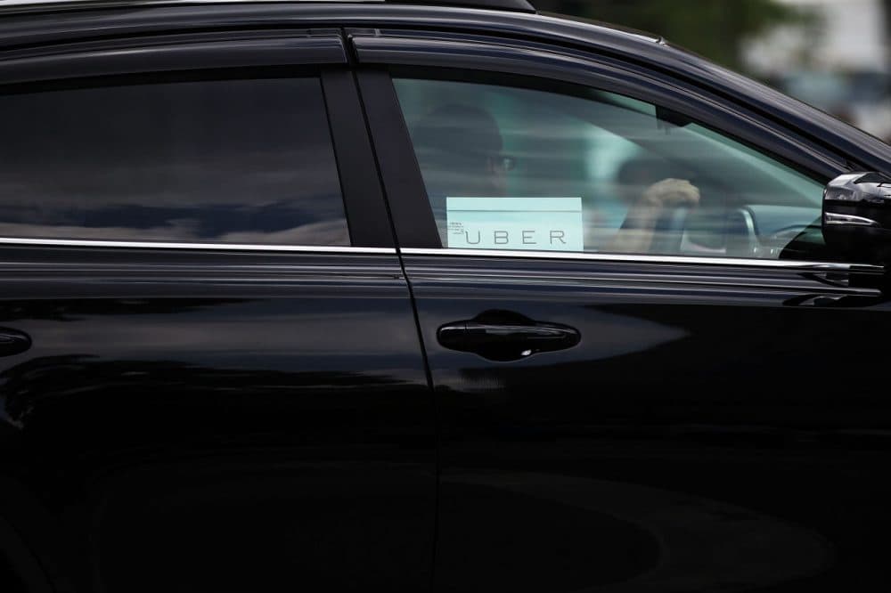 An Uber vehicle is viewed in Manhattan on July 20, 2015 in New York City.  (Spencer Platt/Getty Images)