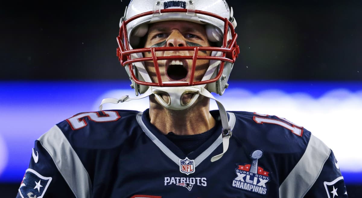 In this Sept. 10, 2015 photo, New England Patriots quarterback Tom Brady yells as he takes the field before the first game of the season against the Pittsburgh Steelers in Foxborough, Mass. (Charles Krupa/AP)