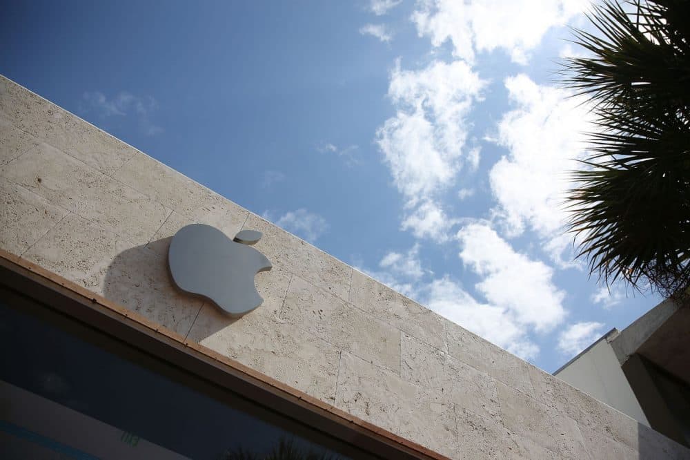 An Apple sign is seen outside of a store  on April 26, 2016 in Miami Beach, Florida.  Investors are awaiting Apple Inc. scheduled reporting today of its fiscal quarter that ended March 26.  (Joe Raedle/Getty Images)