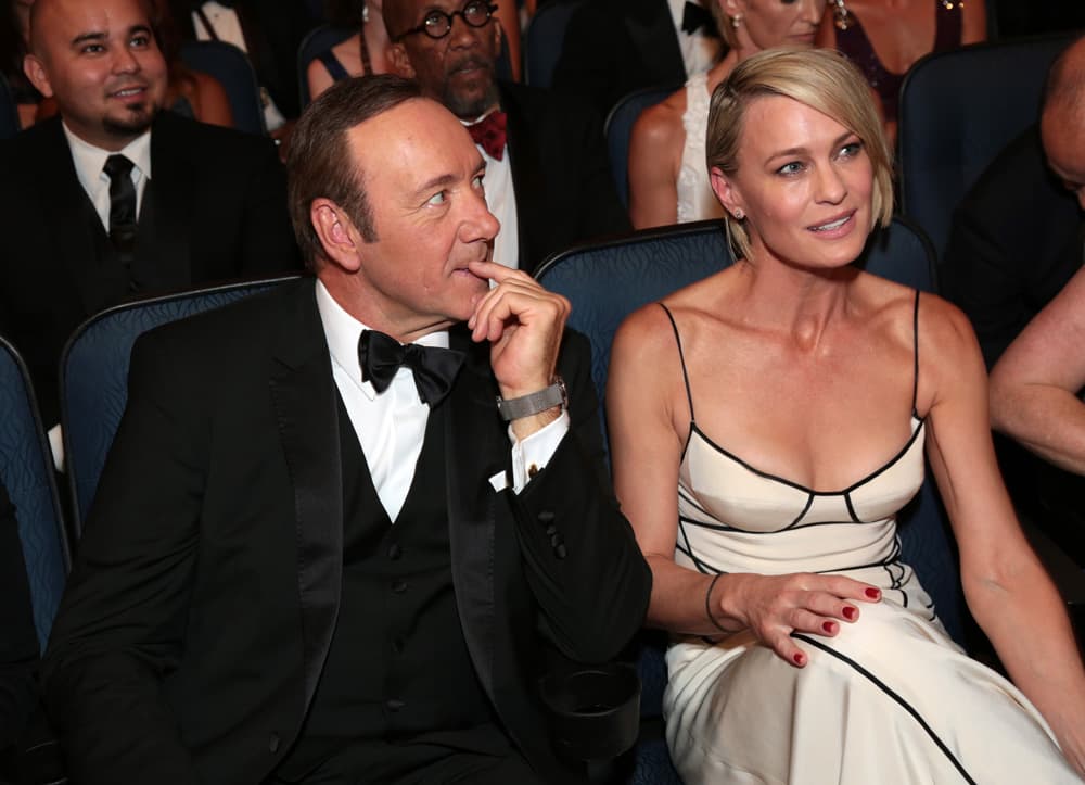 Robin Wright, right, attending the Emmy Awards in 2015 with Kevin Spacey. The pair star in "House of Cards" on Netflix. Wright recently shared that she fought to have an equal salary as Spacey. (Alex Berliner/Invision for the Television Academy/AP)