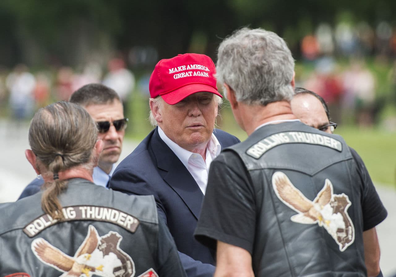 Republican presedential candidate Donald Trump shakes hands with veterans during the annual Rolling Thunder "Ride for Freedom" parade ahead of Memorial Day in Washington, DC, on May 29, 2016. (Andrew Caballero-Reynolds/AFP/Getty Images)