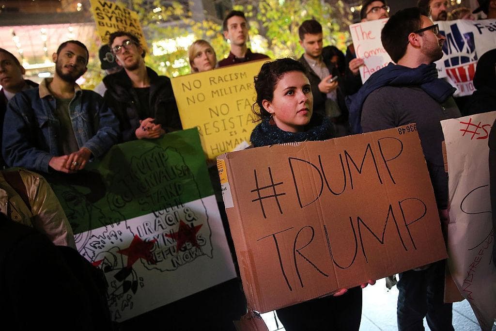 On December 10, 2015, people gathered at a demonstration against presidential candidate Donald Trump's recent remarks concerning Muslims at Columbus Circle in New York City (Spencer Platt/Getty Images)