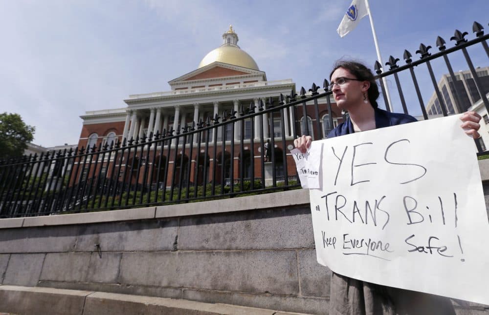 Asa Goodwillie, of Watertown, Mass., who is transgender, advocates for the passage of a transgender rights bill that passed in the Massachusetts House on Wednesday. (Charles Krupa/AP)
