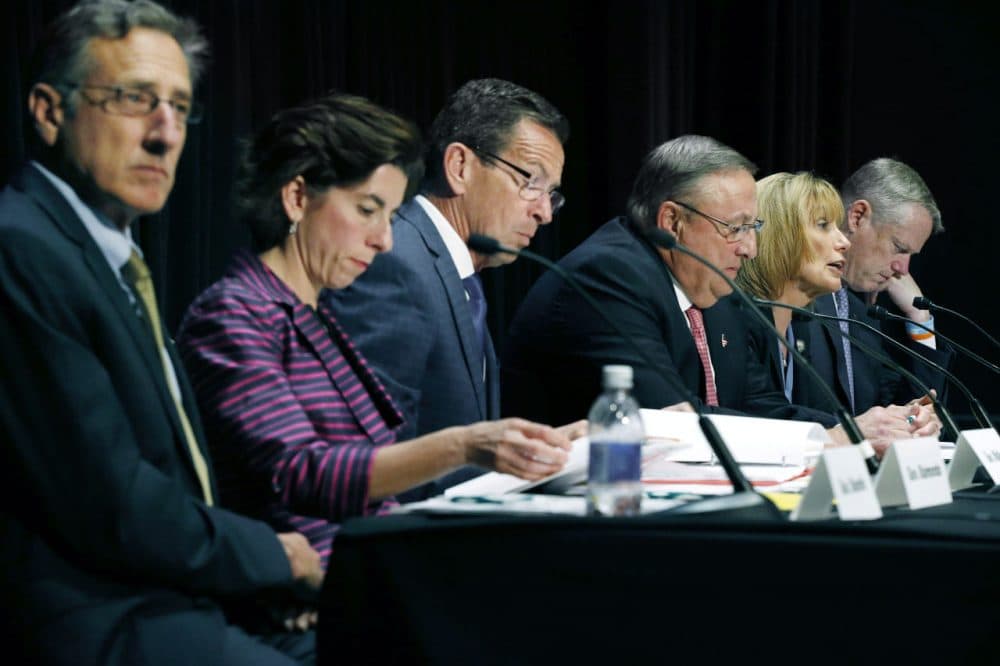 Seated from left are Vermont Gov. Peter Shumlin, Rhode Island Gov. Gina Raimondo, Connecticut Gov. Dannel P. Malloy, Maine Gov. Paul LePage, Hassan, and Massachusetts Gov. Charlie Baker. The governors met Tuesday in Boston to discuss strategies to deal with the opioid addiction problem in all their states. (Michael Dwyer/AP)