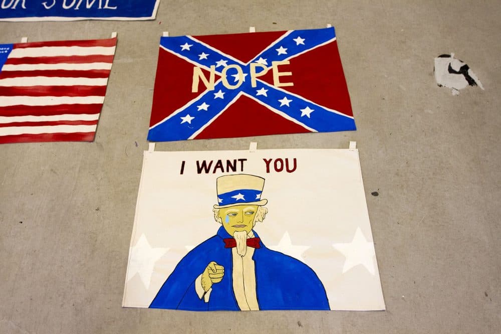 Signs at artist Pat Falco's faux Boston Campaign headquarters (Joe Difazio for WBUR)