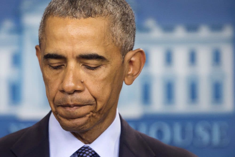 President Obama pauses as he speaks Sunday about the massacre at a Orlando nightclub that claimed 50 lives. (Pablo Martinez Monsivai/AP)
