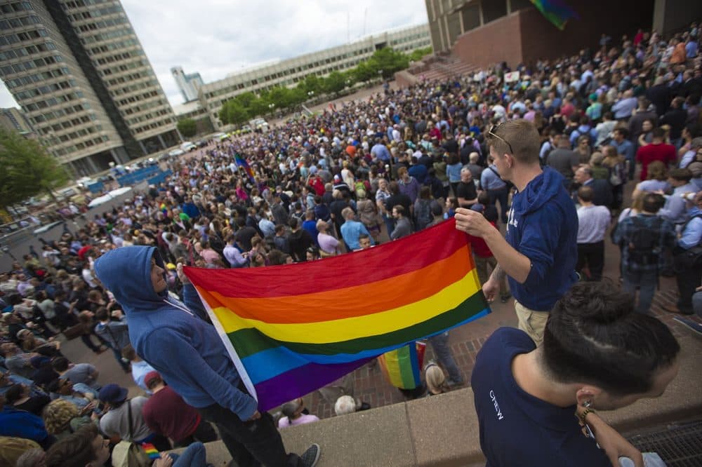 Hundreds gathered on City Hall Plaza in honor of those killed at the Pulse Dance Club in Orlando. (Jesse Costa/WBUR)