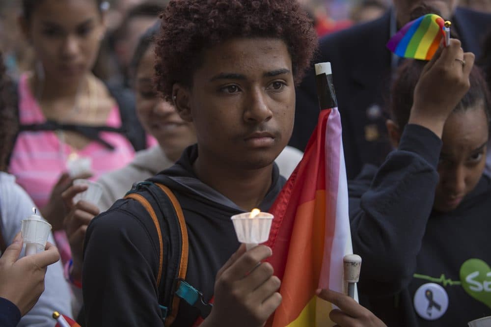 Hundreds gathered on City Hall Plaza in honor of those killed at the Pulse Dance Club in Orlando. (Jesse Costa/WBUR)