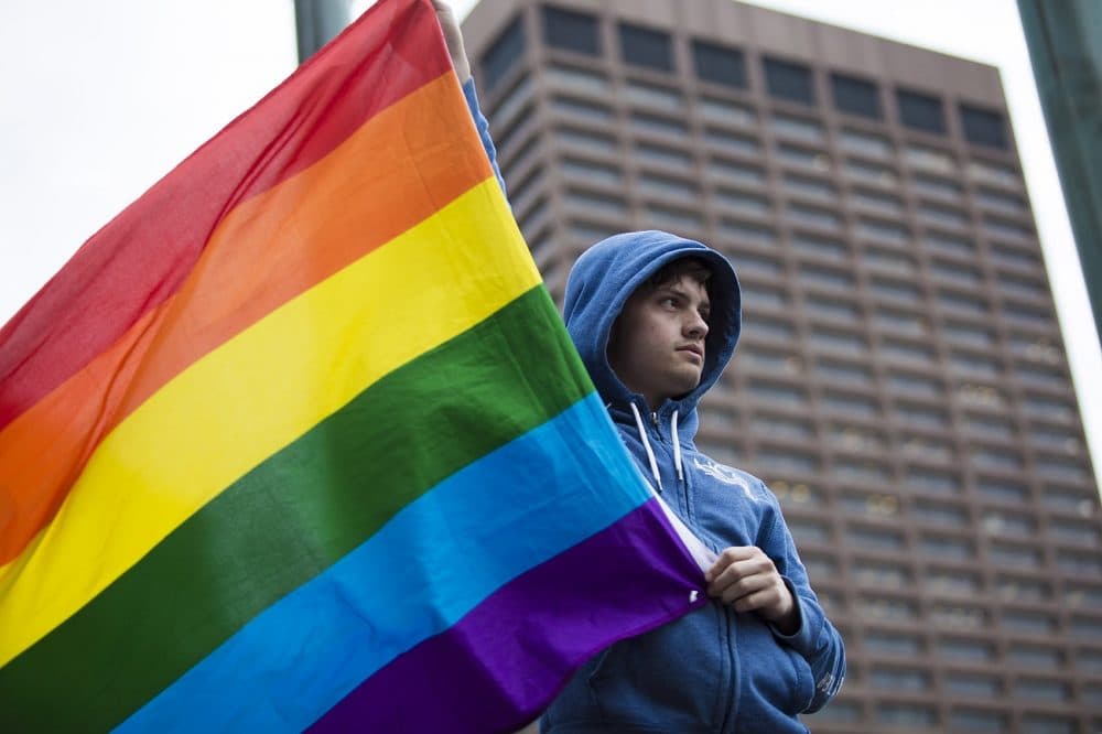 Hundreds gathered on City Hall Plaza in honor of those killed at the Pulse Dance Club in Orlando. (Jesse Costa/WBUR)