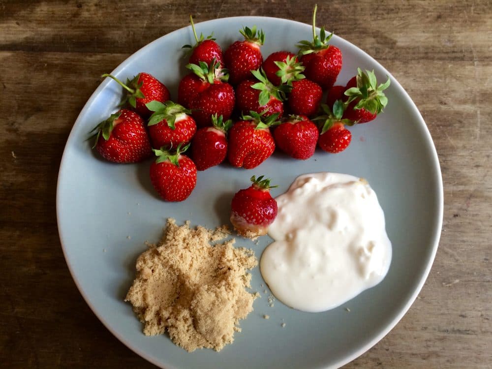 Chef James Haller of Portsmouth, New Hampshire restaurant The Blue Strawbery only served one dessert for all the years that the restaurant existed: ripe strawberries with brown sugar and thick sour cream. (Kathy Gunst for Here &amp; Now)