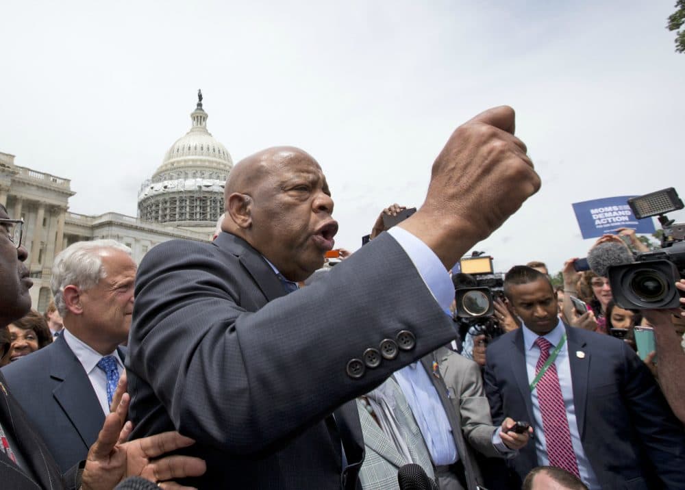 Rep. John Lewis, D-Ga., addresses the crowd after a &quot;sit in,&quot; on the House floor, on Capitol Hill, Thursday, June 23, 2016 in Washington. (Alex Brandon/AP)