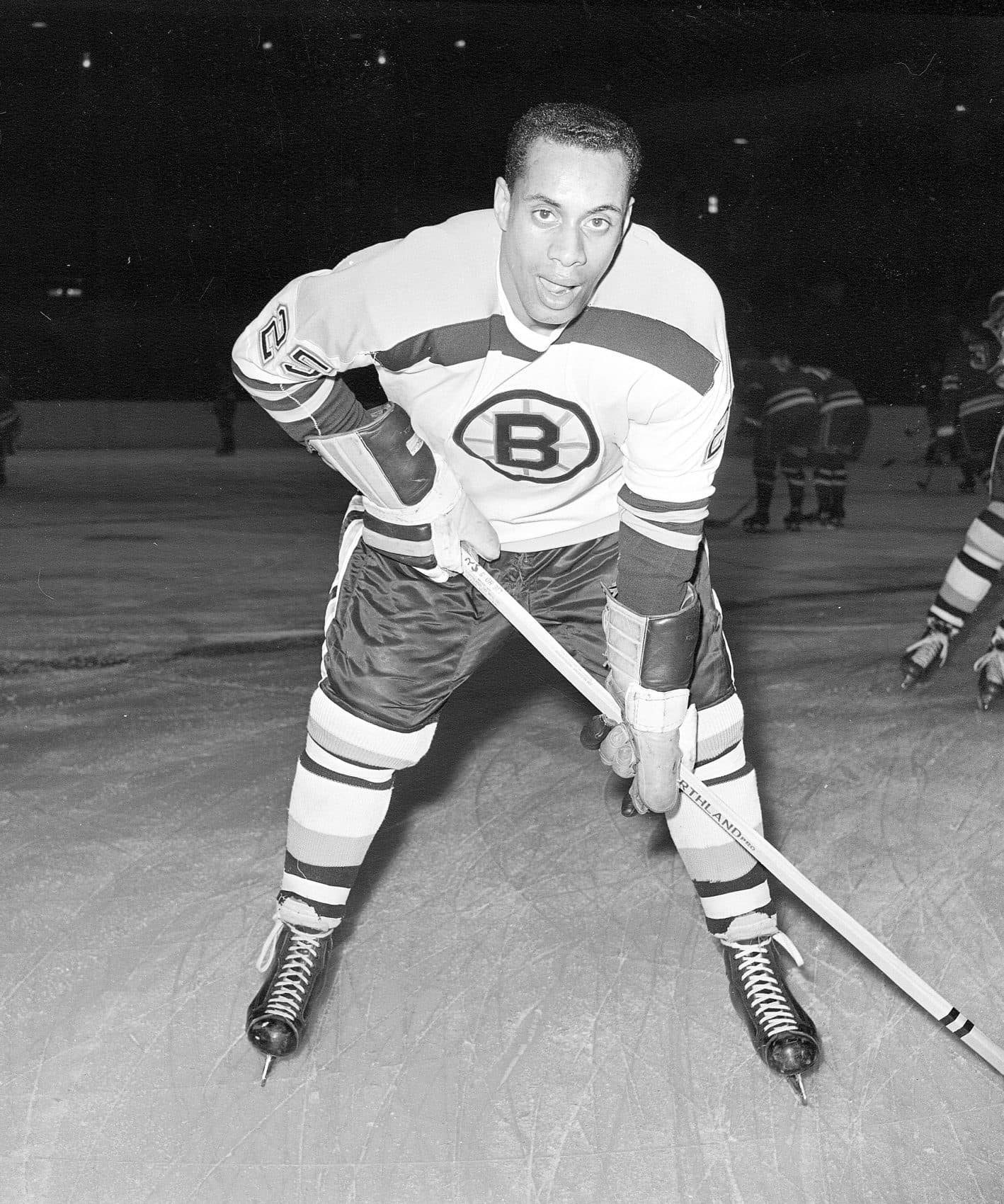 25-year-old left wing Willie O'Ree, the first black player of the National Hockey League, warms up in his Boston Bruins uniform, prior to a game with the New York Rangers at Madison Square Garden in New York City on November 23, 1960. (AP)