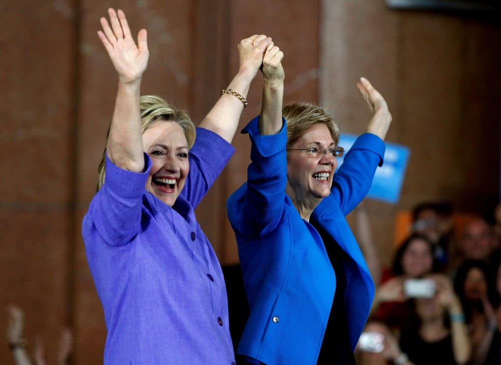 Democratic Presidential candidate Hillary Clinton (L) and U.S. Sen Elizabeth Warren (D-MA) (R) wave to the crowd before a campaign rally at the Cincinnati Museum Center at Union Terminal June 27, 2016 in Cincinnati, Ohio. Warren is helping Clinton campaign in Ohio. (John Sommers II/Getty Images)