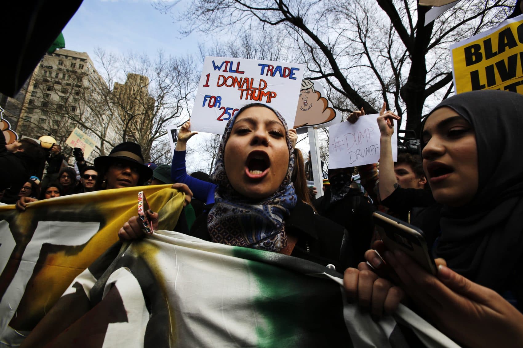 People shout slogans while they take part in a protest against Republican presidential candidate Donald Trump, on March 19, 2016 in New York City. (Eduardo Munoz Alvarez/Getty Images)