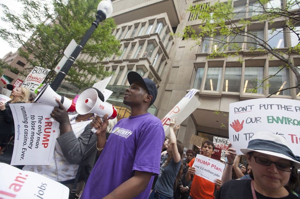 Protesters chanted &quot;Donald Trump has got to go&quot; outside The Langham as the presumptive Republican nominee held a midday fundraiser on Wednesday. (Joe Difazio for WBUR)