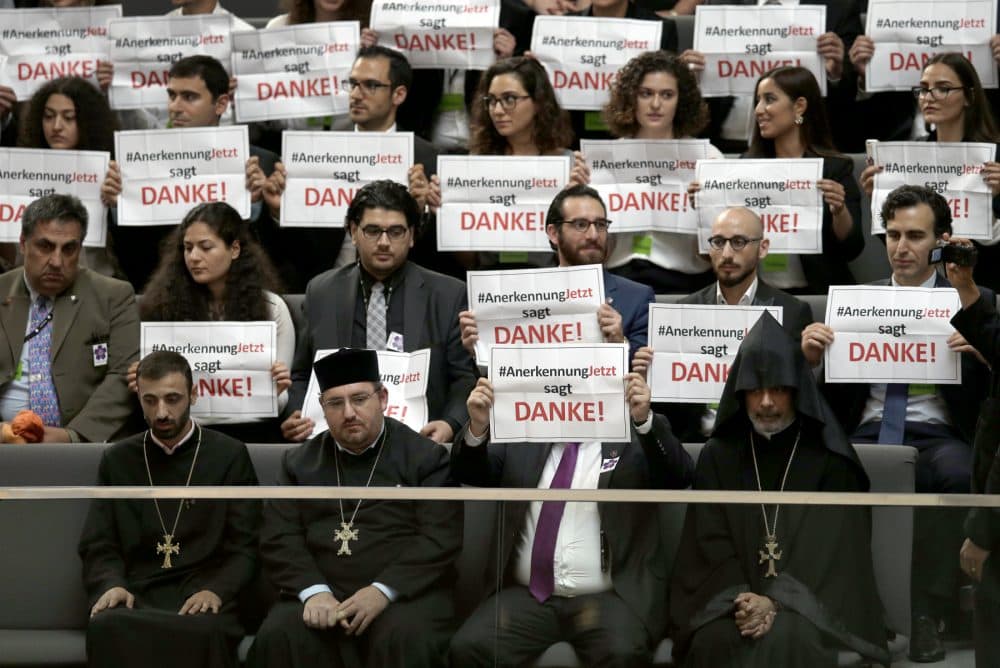 Germany has become the latest nation to recognize the Armenian Genocide. Nir Eisikovits and Timothy Phillips call on three more -- the U.S., Britain and Israel -- to follow suit, regardless of the diplomatic or geopolitical fallout. Pictured: Guests hold posters of the 'recognition now' organization reading &quot;RecognitionNow says Thank you&quot; during a meeting of the German Federal Parliament, Bundestag, in Berlin, Germany, Thursday, June 2, 2016. The German Parliament voted in favor of labeling the killings of Armenians by Ottoman Turks a century ago as genocide. (Michael Sohn/AP)