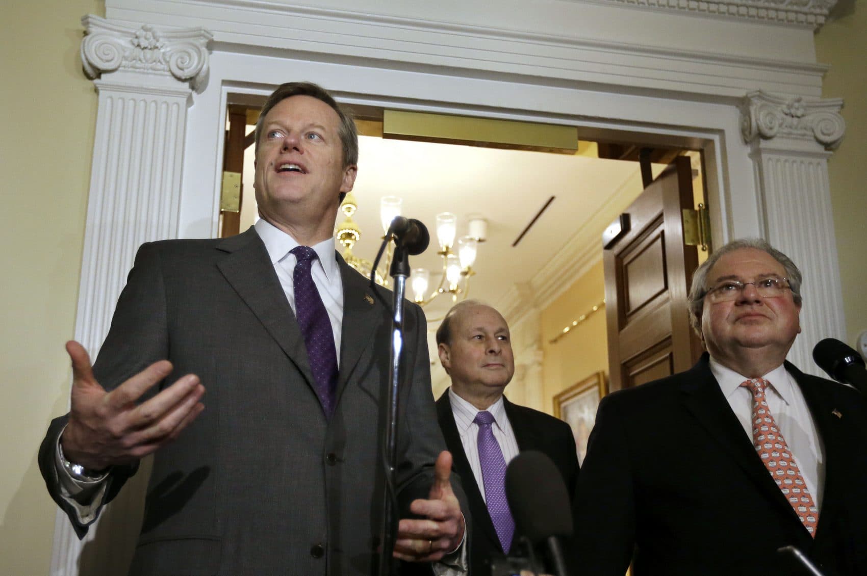 From left: Republican Gov. Charlie Baker, Democratic Senate President Stanley Rosenberg and Democratic House Speaker Robert DeLeo, during a 2015 news conference at the State House (Steven Senne/AP)