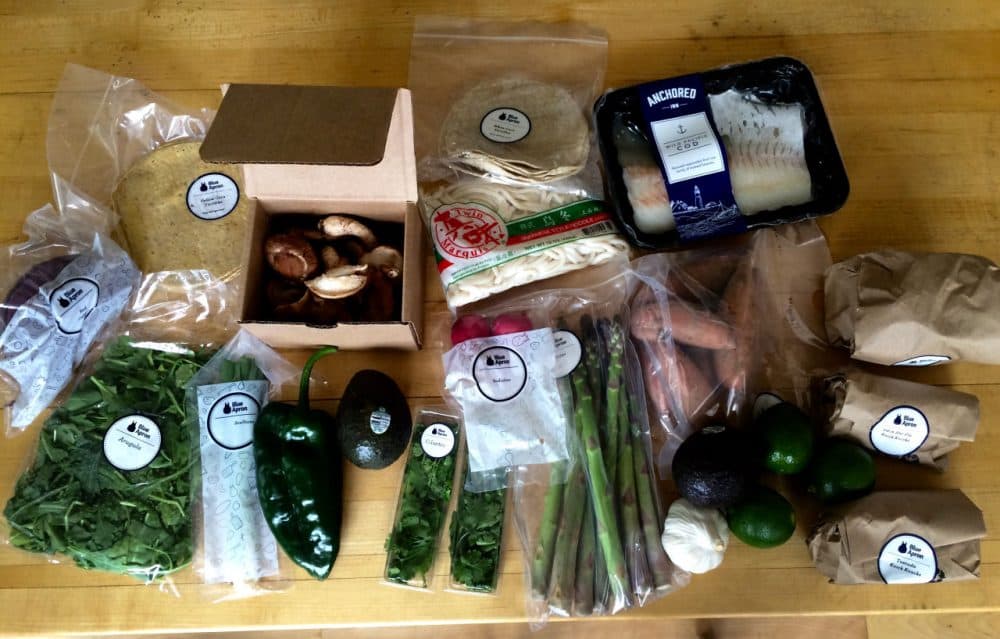 ngredients and packaging from a Blue Apron meal box for three meals. (Kathy Gunst/Here &amp; Now)