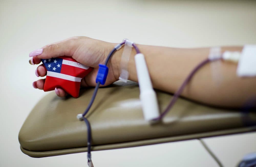 Heads of the hospital associations in New England joined together to record a video encouraging people to donate blood to help the blood shortage at hospitals. (David Goldman/AP)