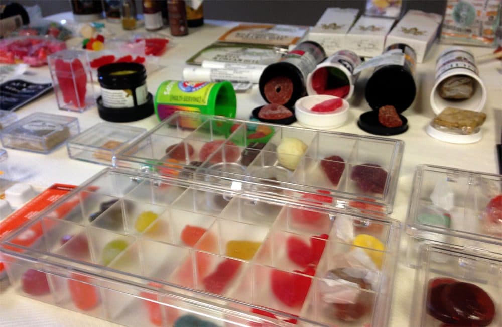 Candy infused with THC is displayed by opponents of legalized recreational marijuana on Thursday. (Steve Brown/WBUR)