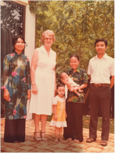 The author as a little girl in Singapore, March 1980. Kathy's mother, Rosette, holds her young son and Kathy's brother, Joseph. (Courtesy of Kathy Le)